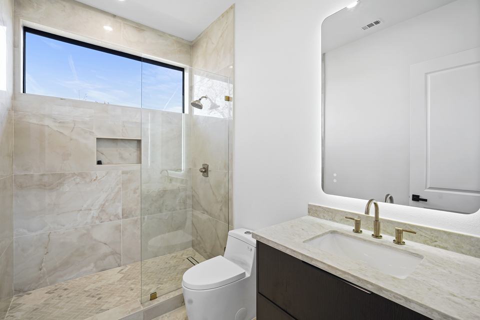 Heavy glass frameless walk-in shower enclosure manufactured by Royal Windoor