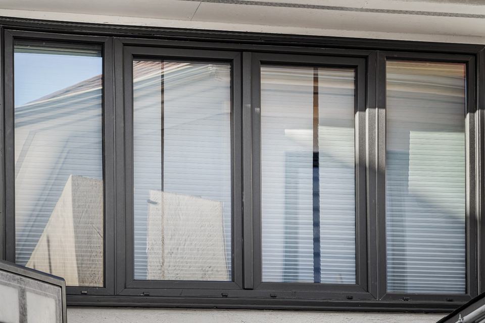 Multi-panel sliding glass door retrofit installation