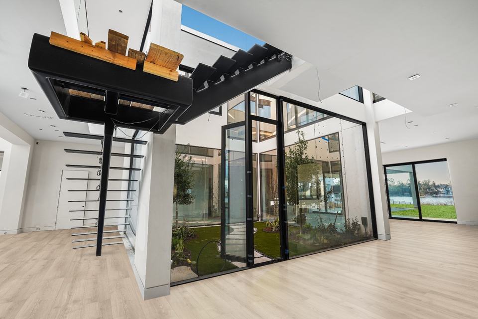 Heavy duty stainless steel standoff pin supported glass railing system